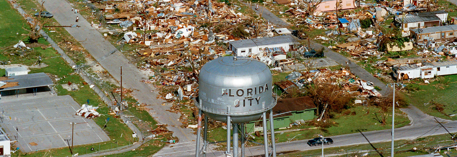 This water tower, shown Aug. 25, 1992, a landmark at Florida City, Fla., still stands over the ruins of the Florida coastal community that was hit by the force of Hurricane Andrew. The storm damage to the South Florida area was estimated at $15 billion, leaving about 50,000 homeless. (AP Photo/Ray Fairall)