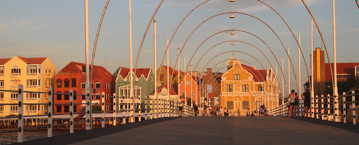Curacao’s waterfront it known for its colorful Dutch-style buildings and its floating bridge.